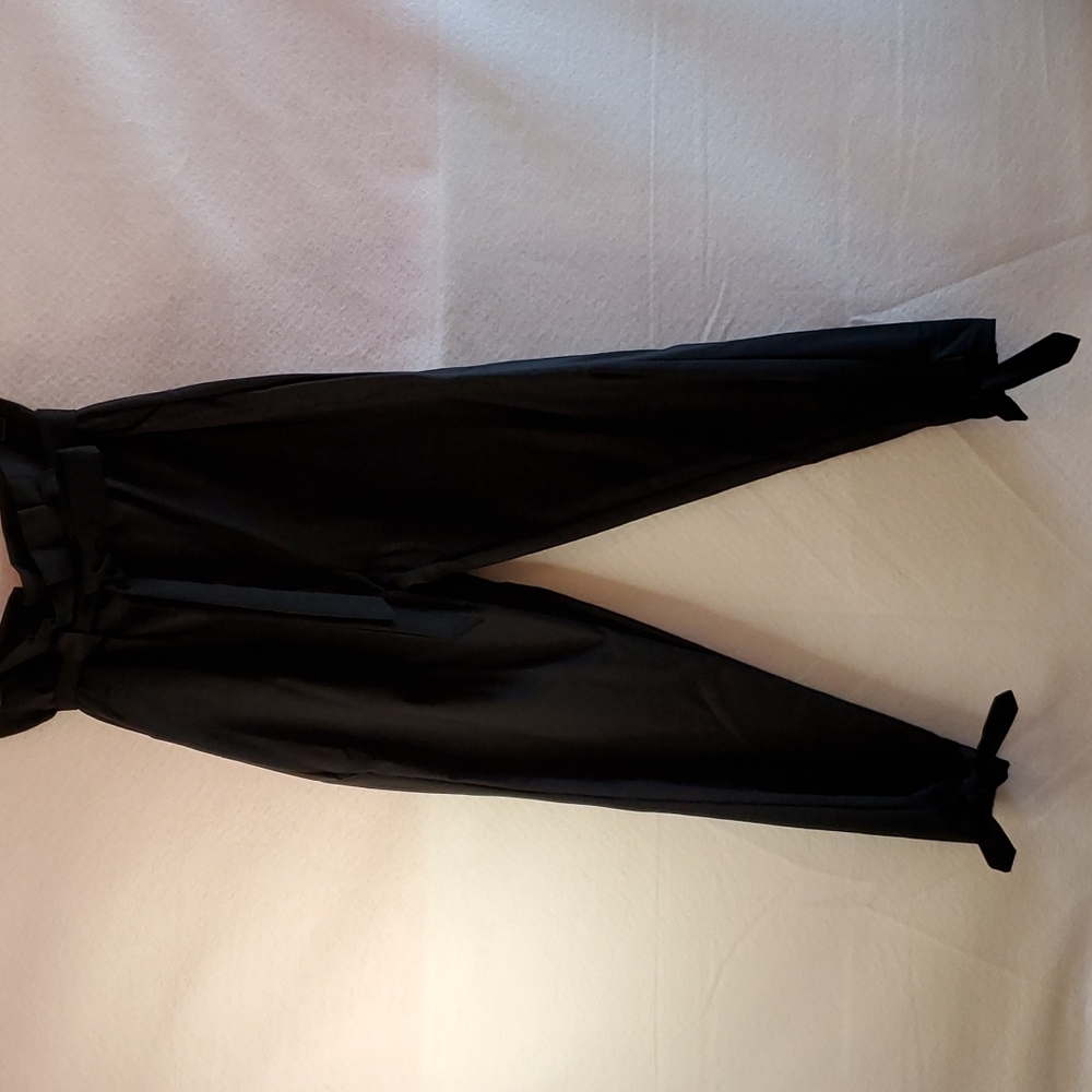 Womens black bag waist pants with belt. Size 2X